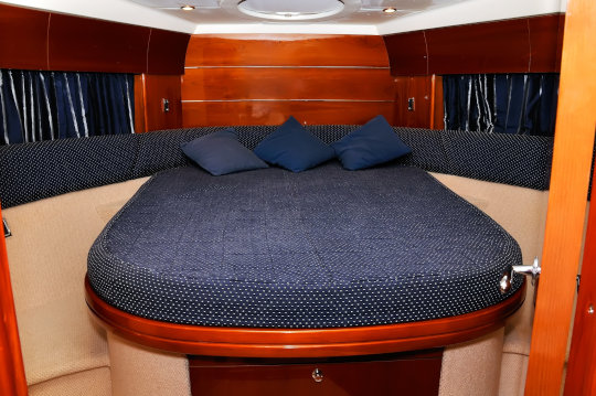 blue bedroom mattress on a motor yacht